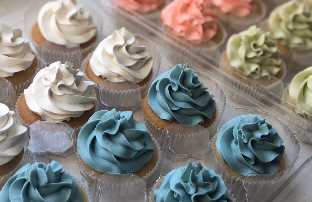 Pastel cupcakes with buttercream swirls